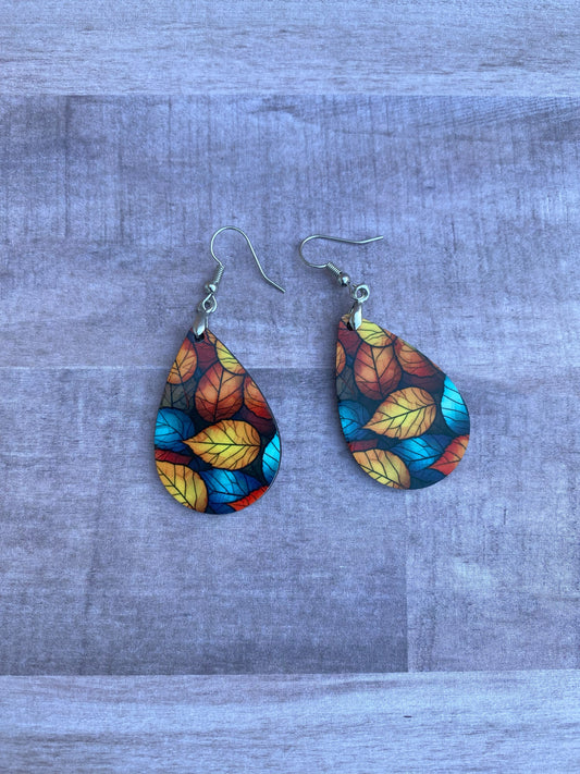 Fall earrings with multicolored leaves, red, blue, yellow, orange, teardrop shaped, image on both sides.