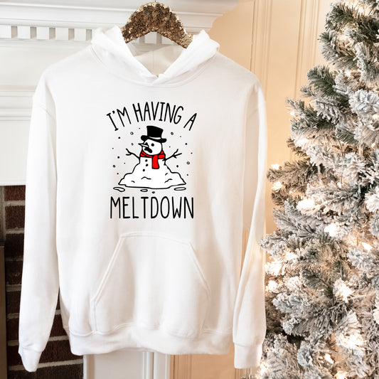 White Hooded long sleeve sweatshirt with the saying I'm having a meltdown in black writing  and picture of melting snowman