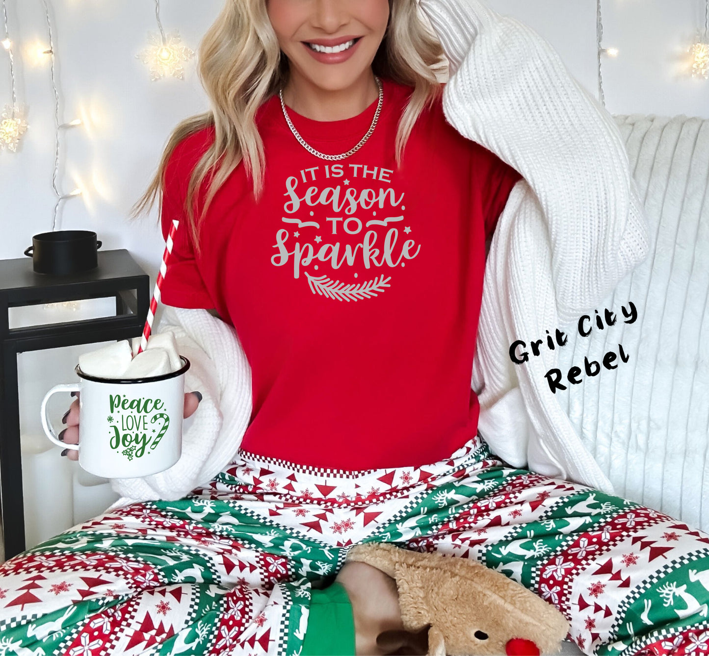 red T-shirt with grey glitter vinyl in the saying It is the season to sparkle. Comes in sizes small to 3X. Grit City Rebel