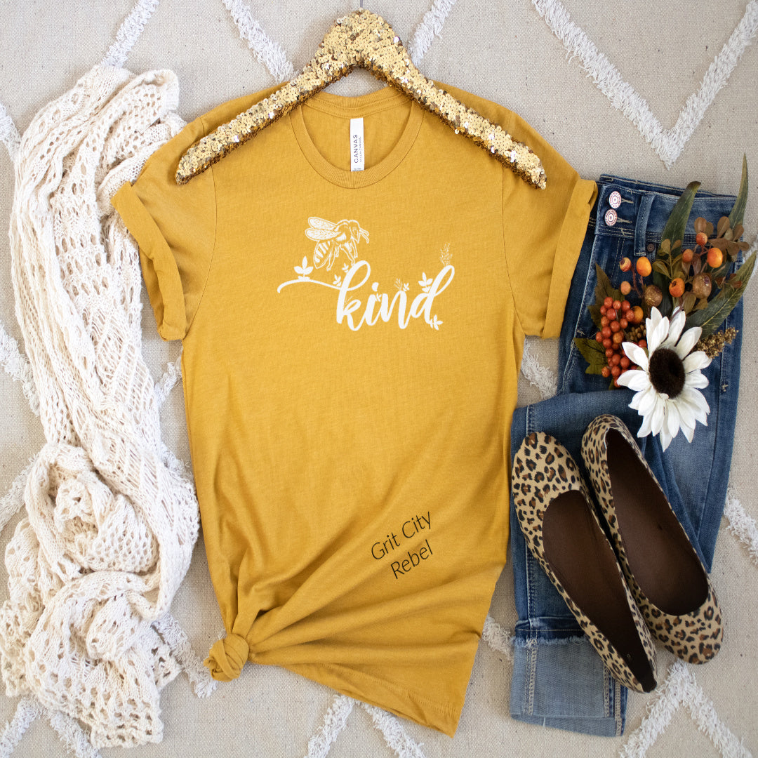 Grit City Rebel, Golden Yellow T-Shirt with a white be and the words Kind in white writting unisex T-Shirt