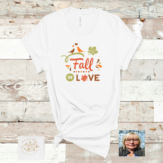 White TShirt with the saying Fall in Love in green and orange corols, Grit City Rebe