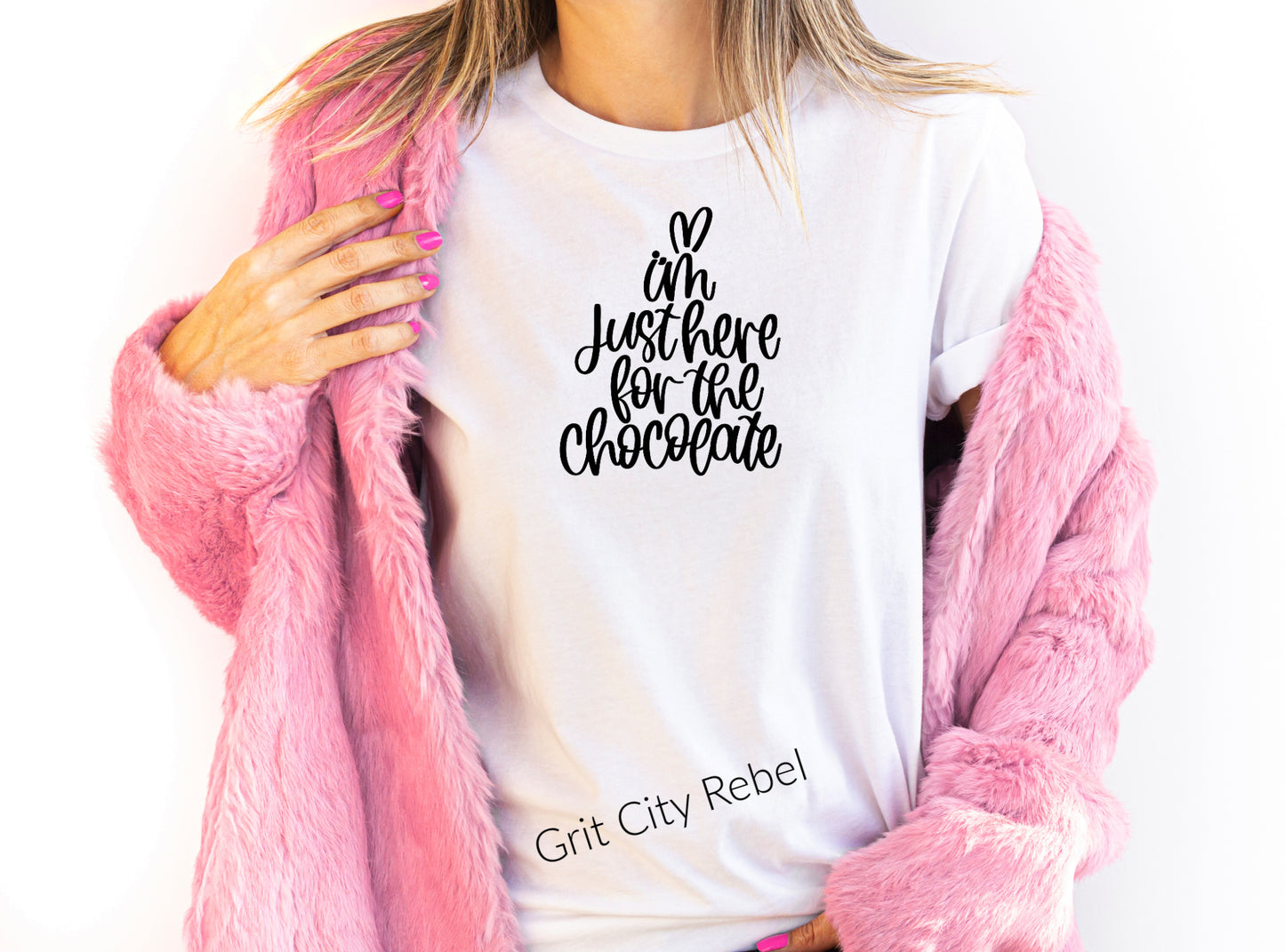 White short sleeve unisex TShirt with the saying I'm just here for the chocolate in black writting