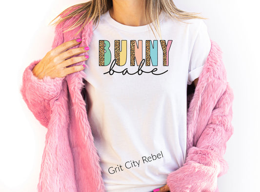 Bunny Babe with Bunny in different patterens in a white unisex T-Shirt Grit City Rebel
