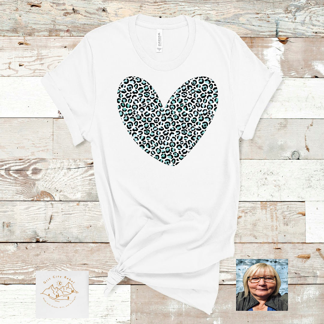 leopard heart in black on a white Tsshirt unisex sizing small to 3X