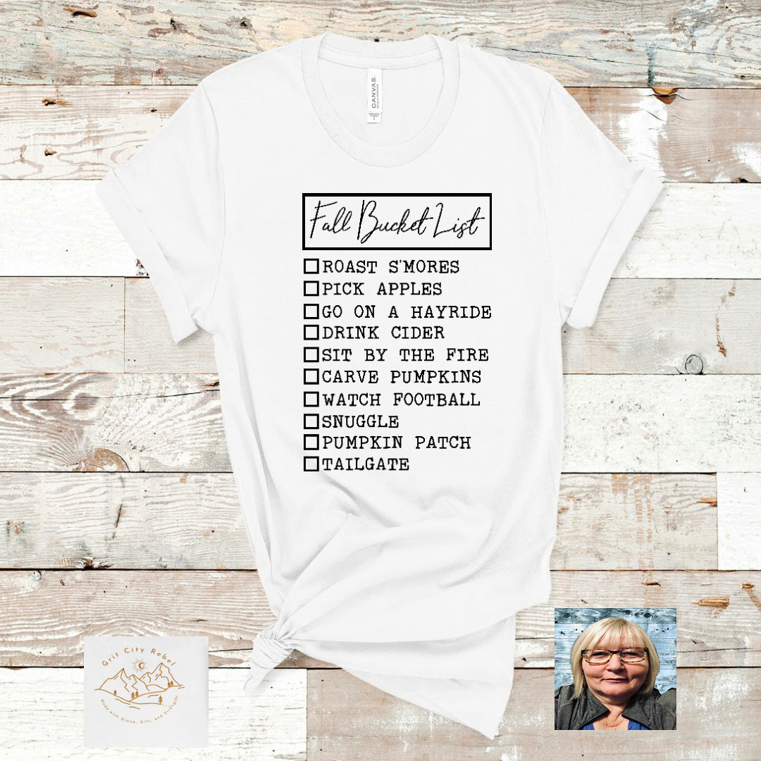 Fall Bucket List in black writting on a white tshirt Grit City Rebel sizing unisex sizes small medium large Xlarge 2X 3X