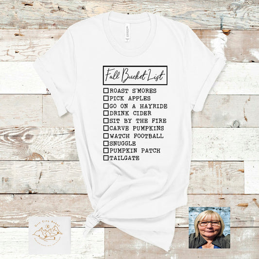 Fall Bucket List in black writting on a white tshirt Grit City Rebel sizing unisex sizes small medium large Xlarge 2X 3X