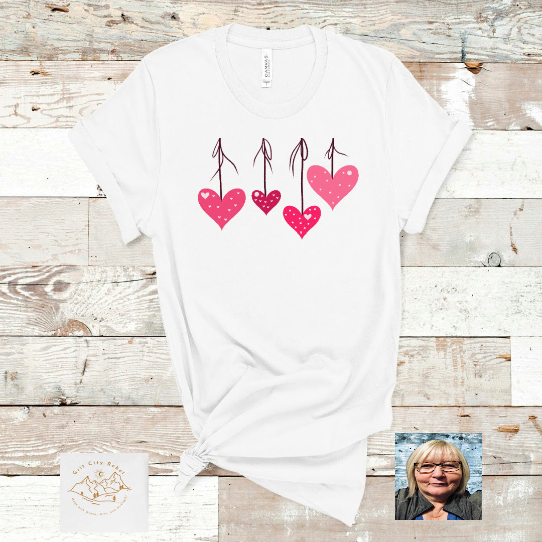 Grit City Rebel Valentine Day, Love hanging pink hearts drom black string with litlle hearts around them for love. unisex sizing small to 3X