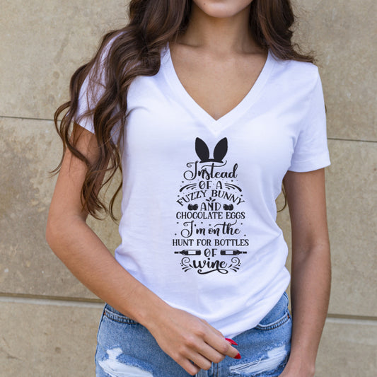 White unisex TShirt with the saying Instead of a Fuzzy Bunny and Chocolate eggs I am on  the hunt for bottles of wine.
