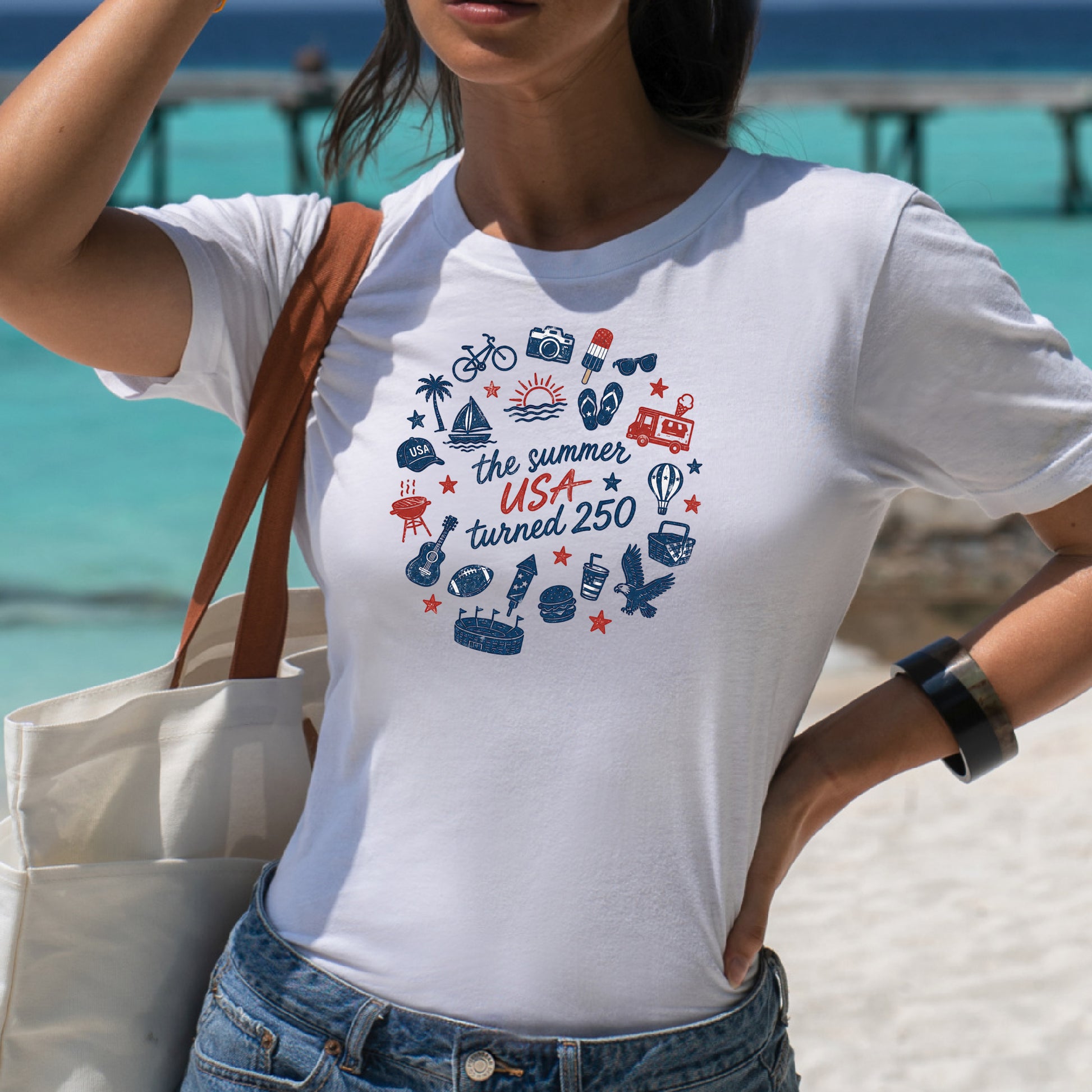 Grit city rebel  white unisex t-shirt with the phrase "the summer USA turned 250" with summer elements. Available in sizes small to 3xl. 