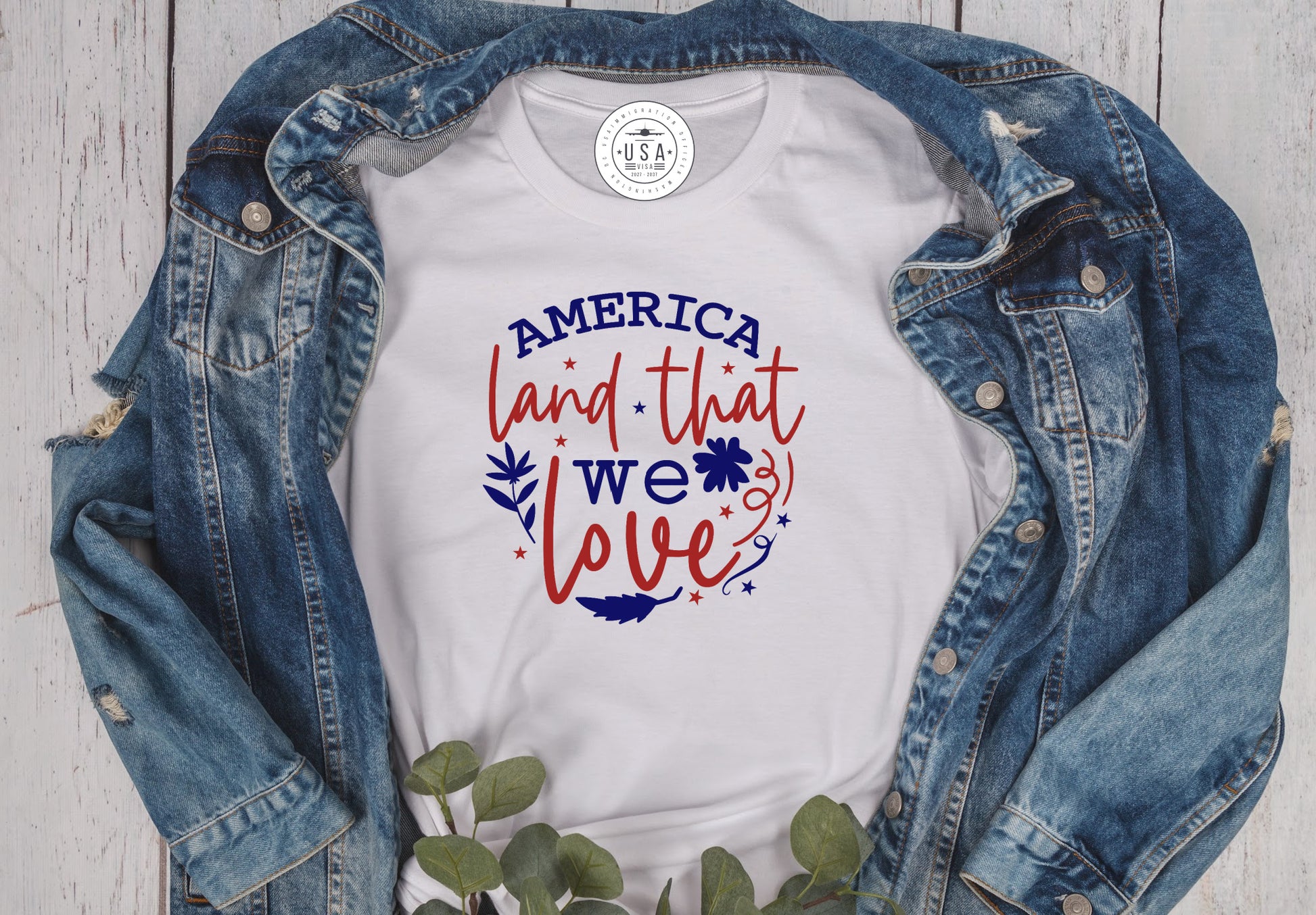 White unisex fit short sleeve T-Shirt with America land that we love in Red White and Blue