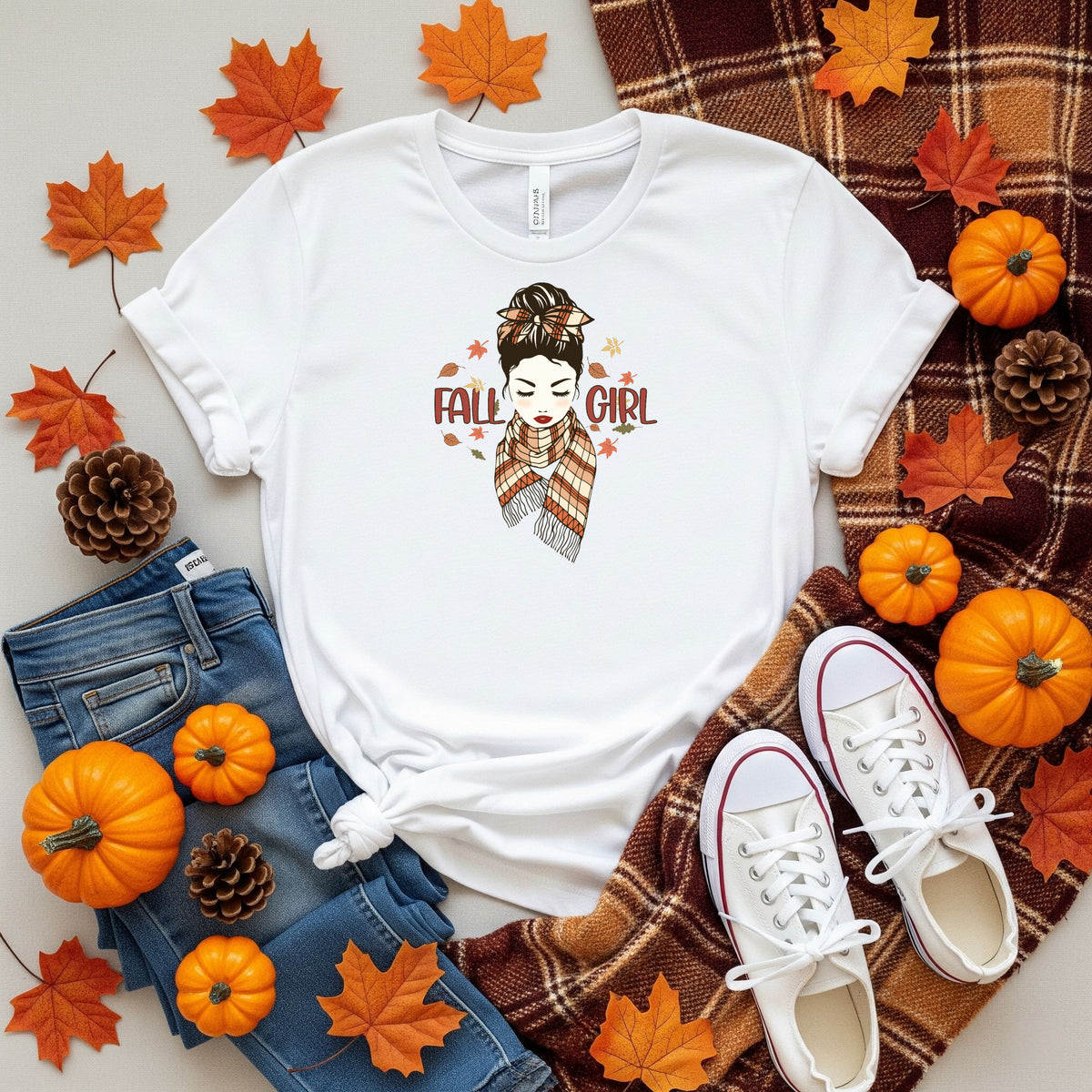 grit city rebel unisex short sleeve t shirt in white with a picture of a Fall girl with a bun and a neck scarf. Comes in sizes small to 3X
