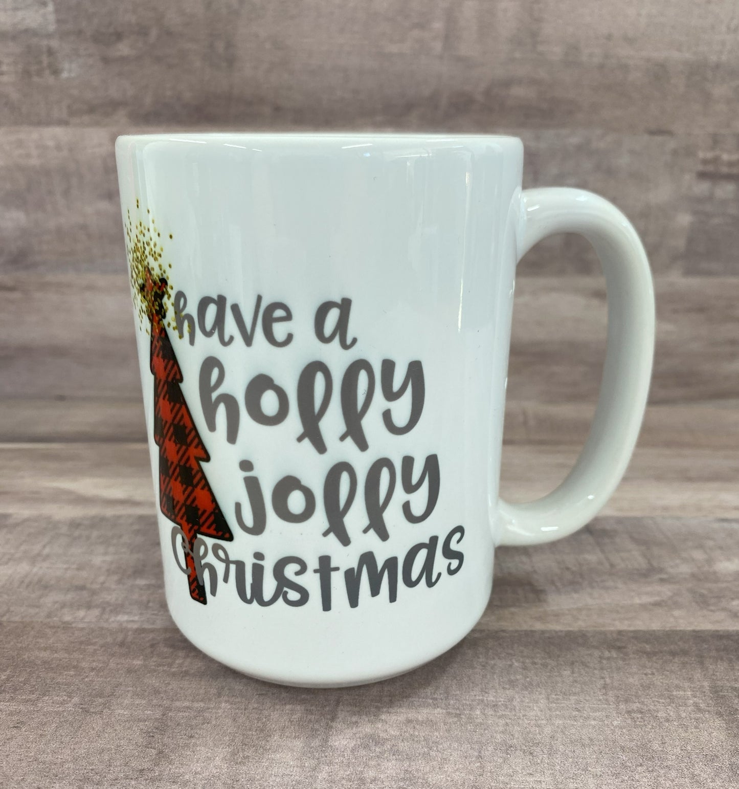 Christmas Tree Plaid Image and saying "Have a Holly Jolly Christmas" on 16 oz Cermaic Mug