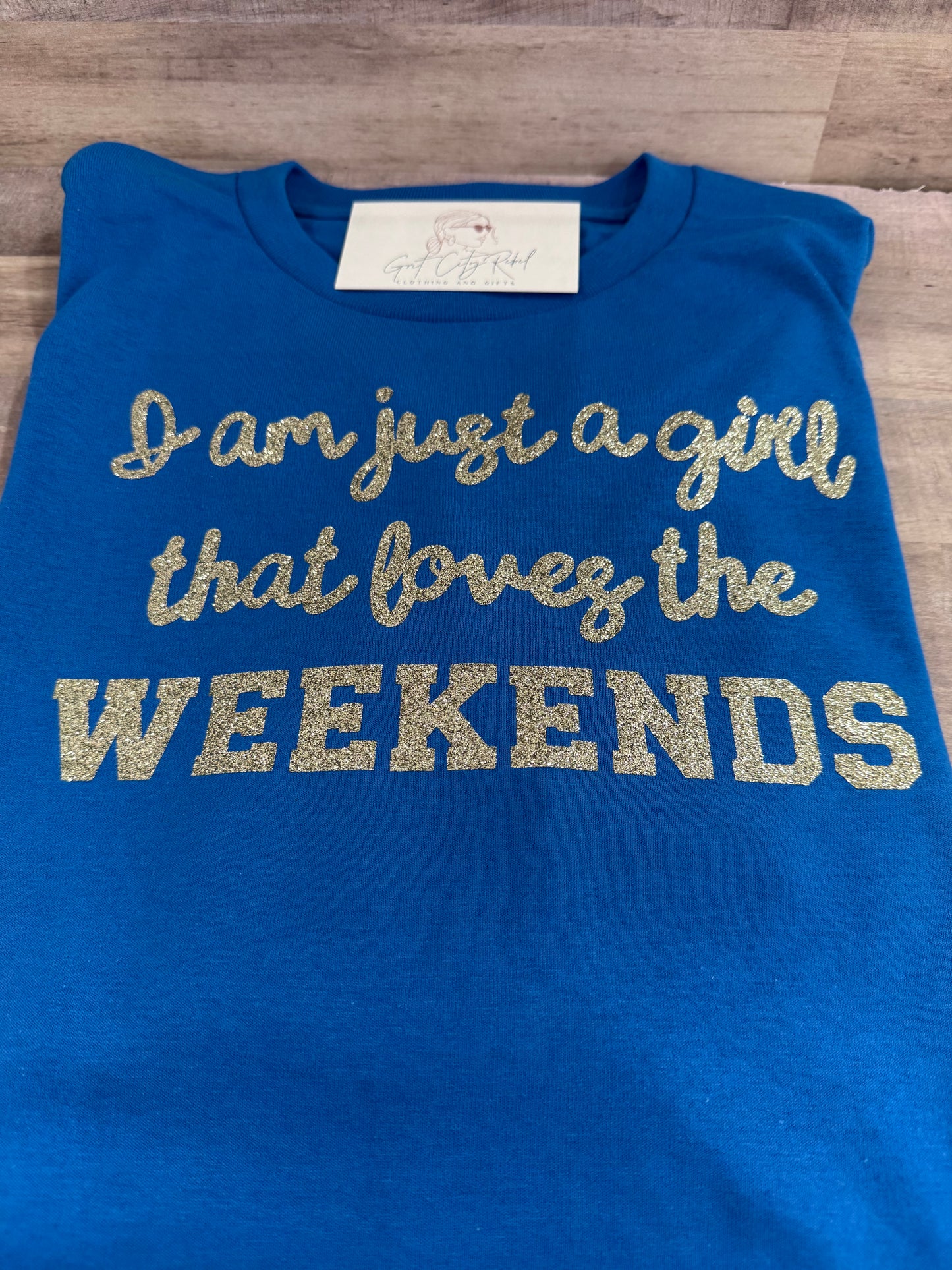 Just a Girl Who Loves Weekends phrase on a unisex short sleeve T-Shirt of the month. This is only a Tshirt not a subscription no free gifts added.