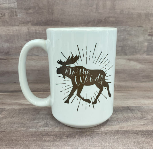 16oz ceramic mug with the image of a moose (in brown) with the phase into the woods (inside the moose image) on both sides of the mug - grit city rebel