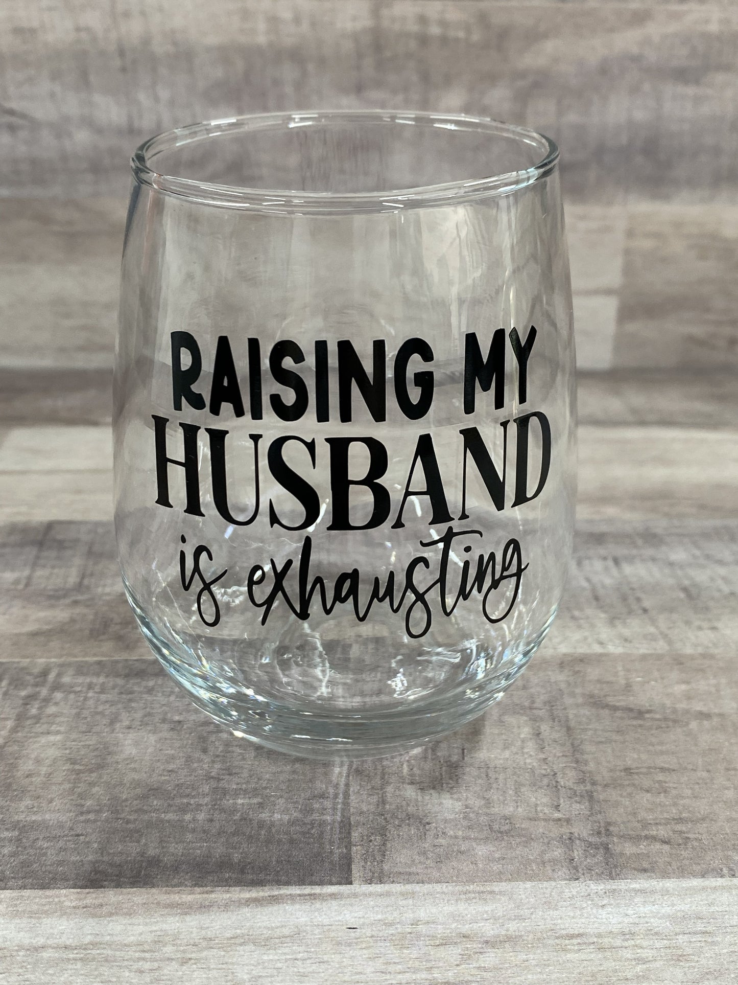 Raising My Husband Is Exhausting on a 15oz stemless wine glass