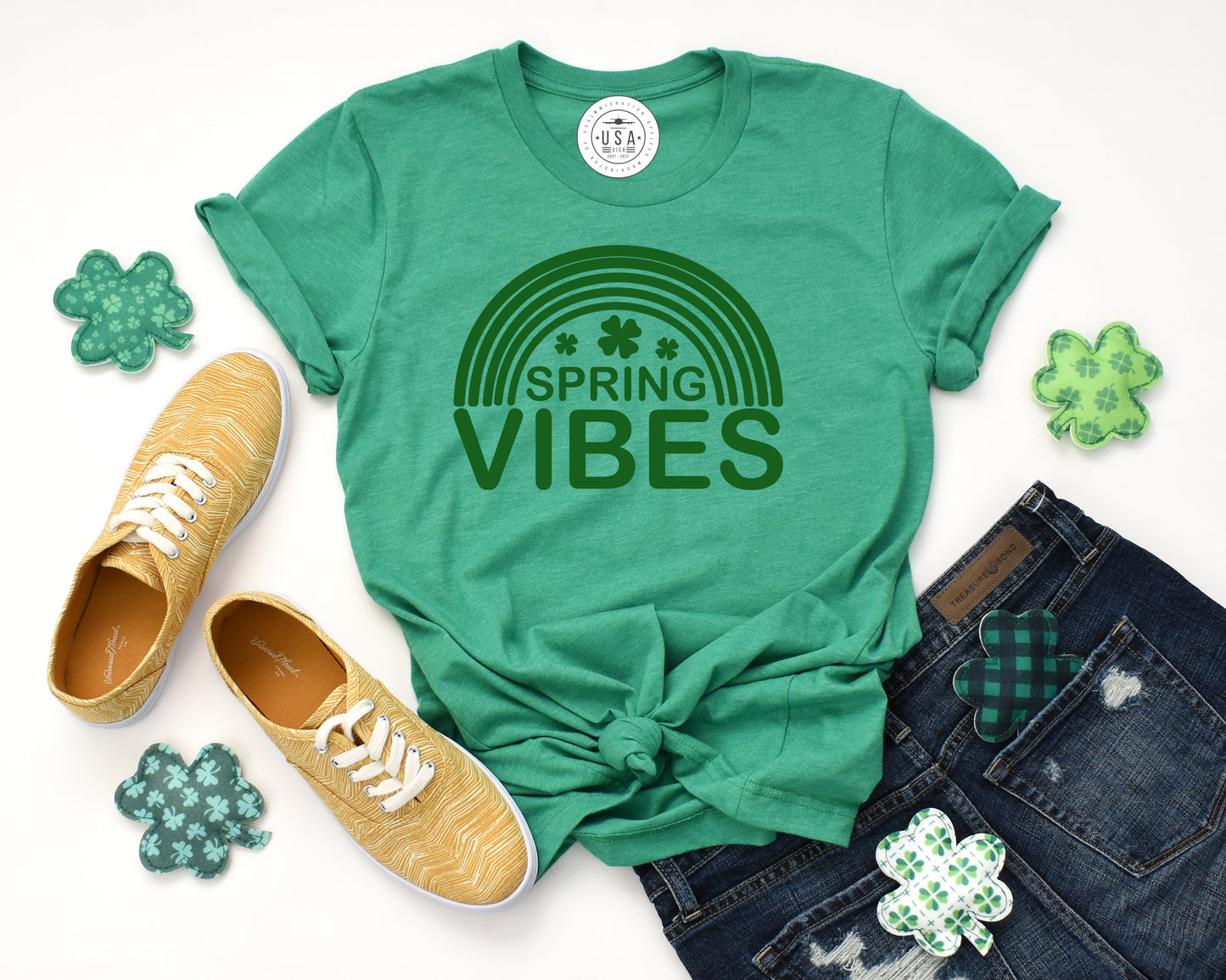 Grit City Rebel VIP Tshirt of the month for February. A aquamarine tshirt with the saying spring vibes in green. Sizes small to 3X unisex fit