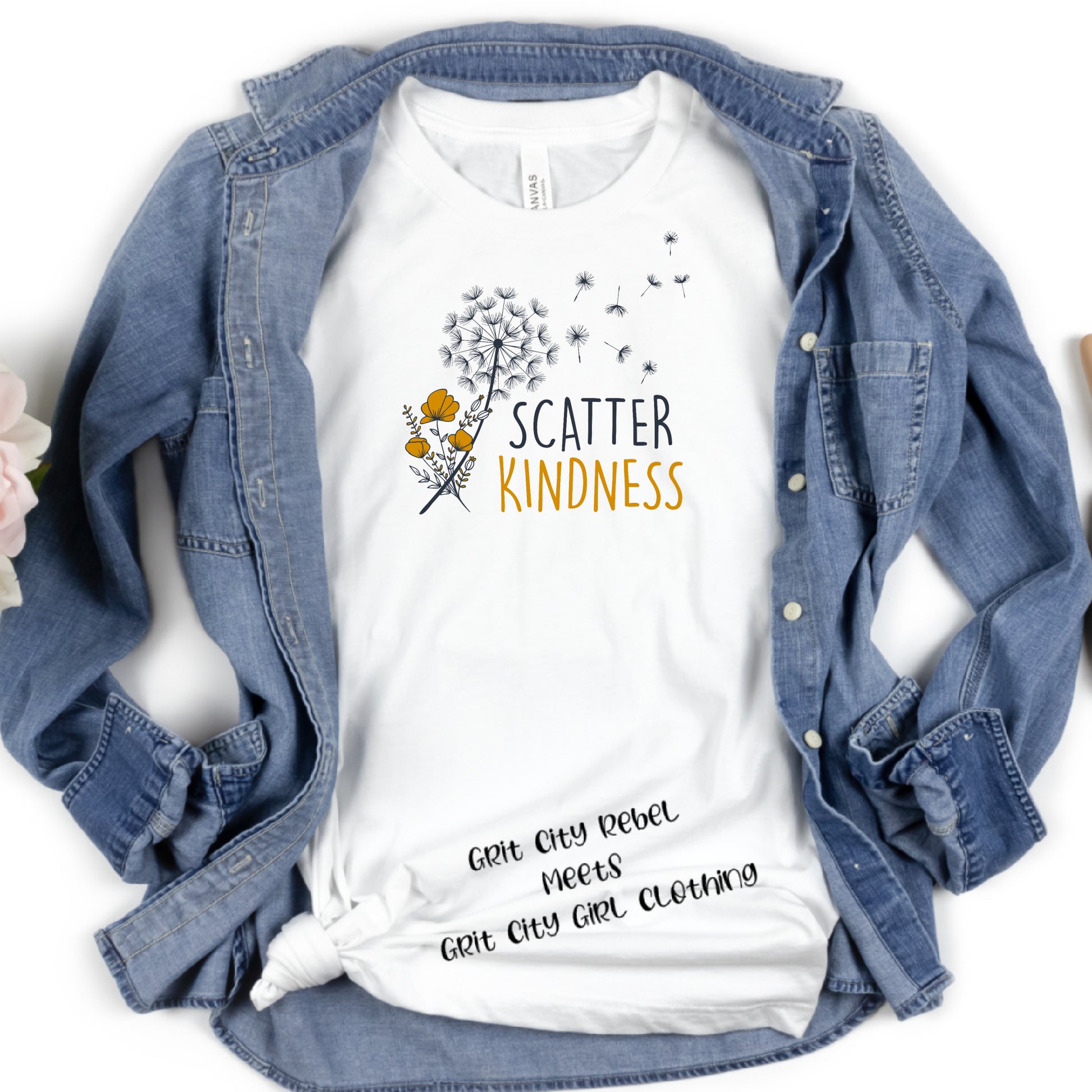 white unisex T-Shirt with a dandelion image in the wind and the saying scatter Kindenss Grit City Rebel