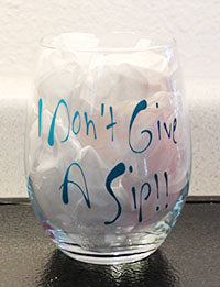 15oz Wine glass with the saying I don't Give a Sip blue writing Grit City Rebel
