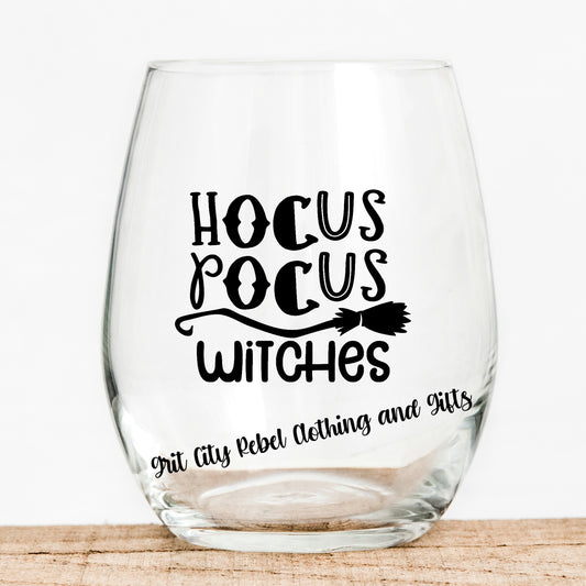 15oz Wine glass with the saying Hocus Pocus Witches in black writing Grit City Rebel