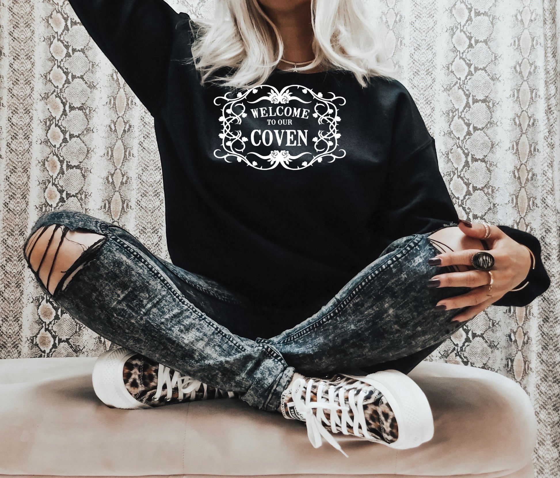 Black Long Sleeve Sweatshirt with the saying Welcome To Our Coven in white lettering