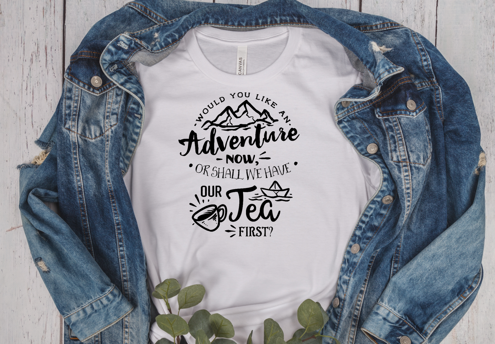 white short sleeve unisex fit T-Shirt with the saying would you like an adventure now or shall we have our tea first in black writting
