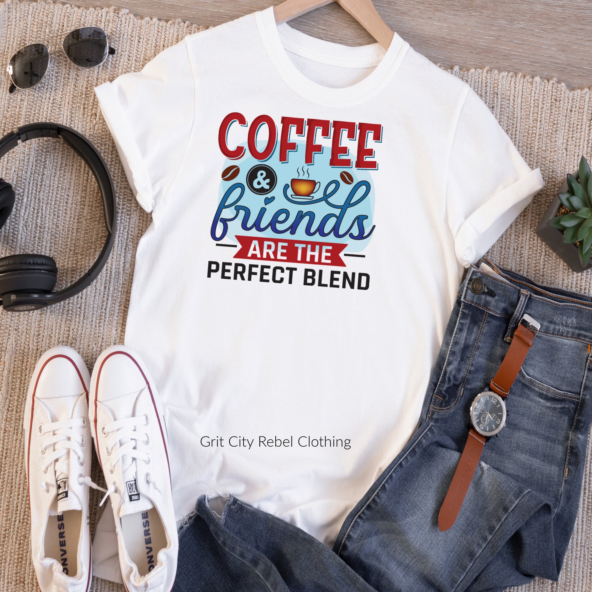 White short sleeve Tshirt with the saying in blue, red and black of Coffee & friends Are The Perfect Blend
