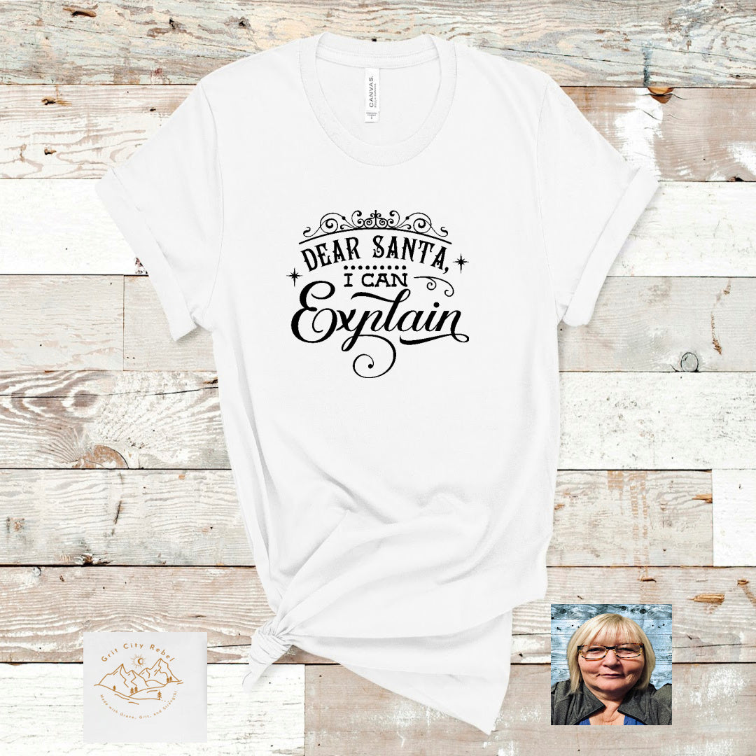 White unisex fit T-Shirt with the saying "Santa I can Explain'