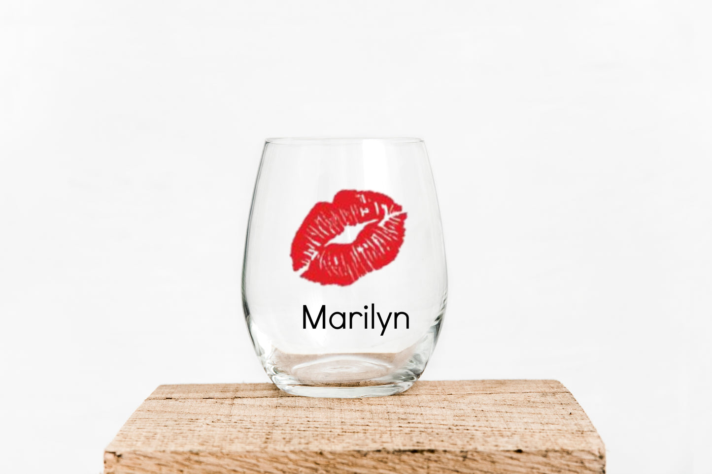 15oz Wine glass withlips in red writing  has Marilyn in blackGrit City Rebel