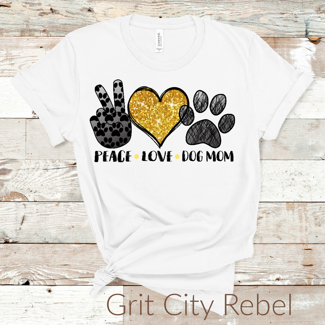White TShirt with Leopard peace sign, Gold sparkle heart, Faded black paw print and the words under the design Peace Love Dog mom